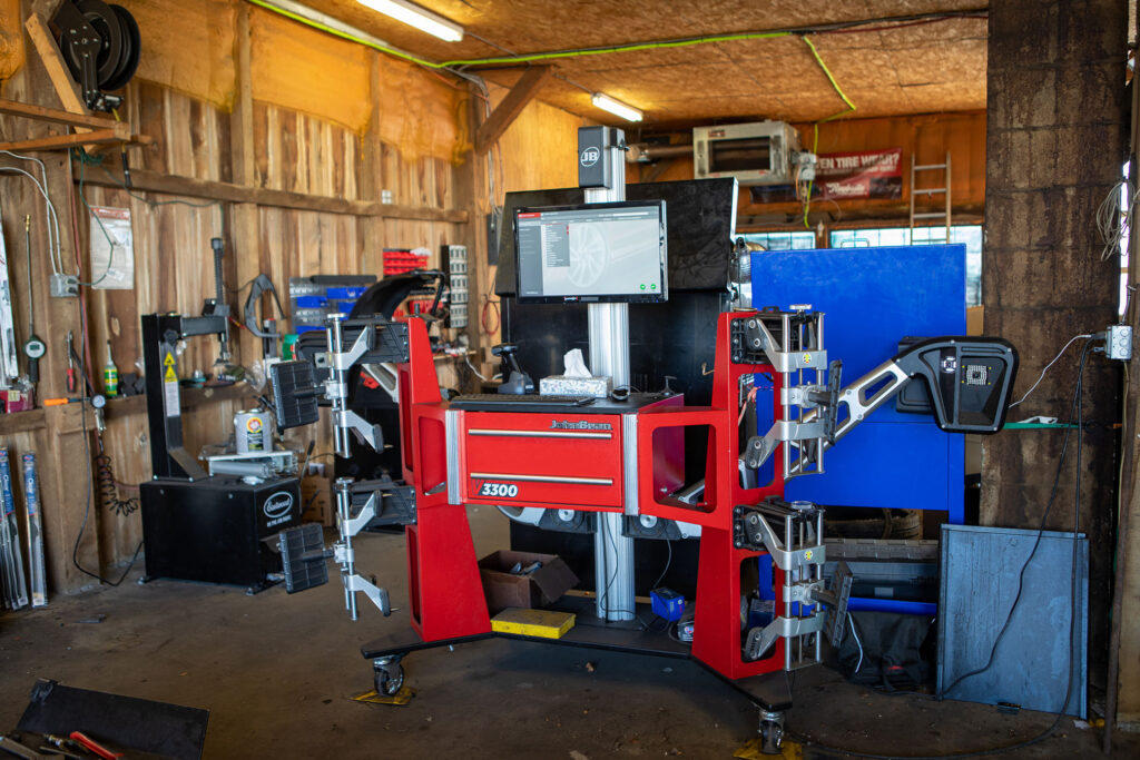 Photo of the red wheel alignment machine