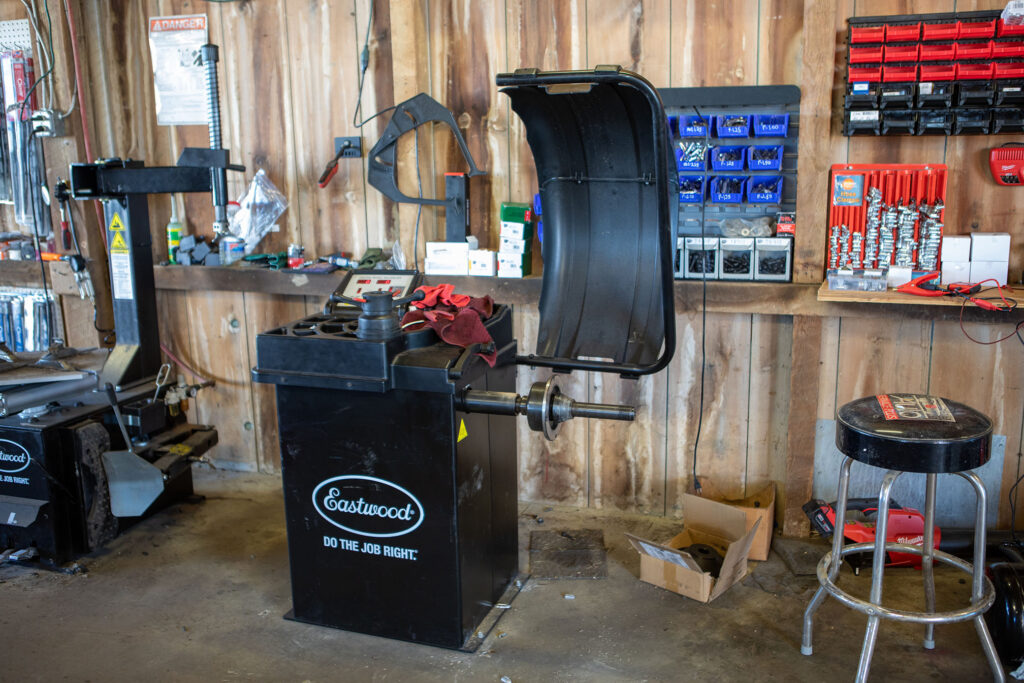 Photo of a black tire balancing machine