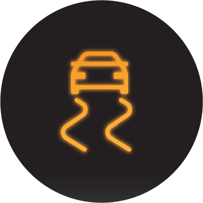 A glowing yellow traction control dashboard light icon on a black background